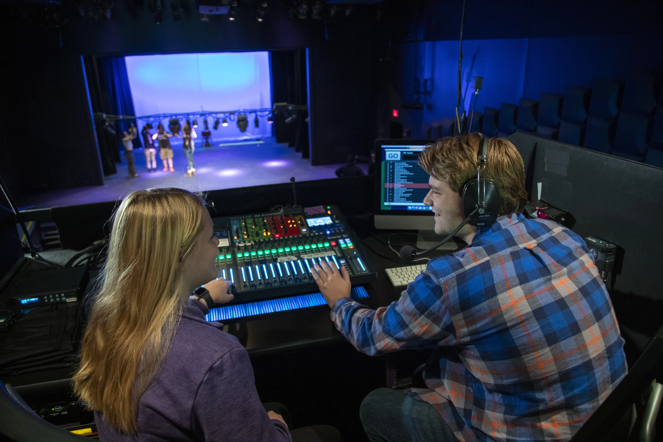 Students at the Theatre sound board